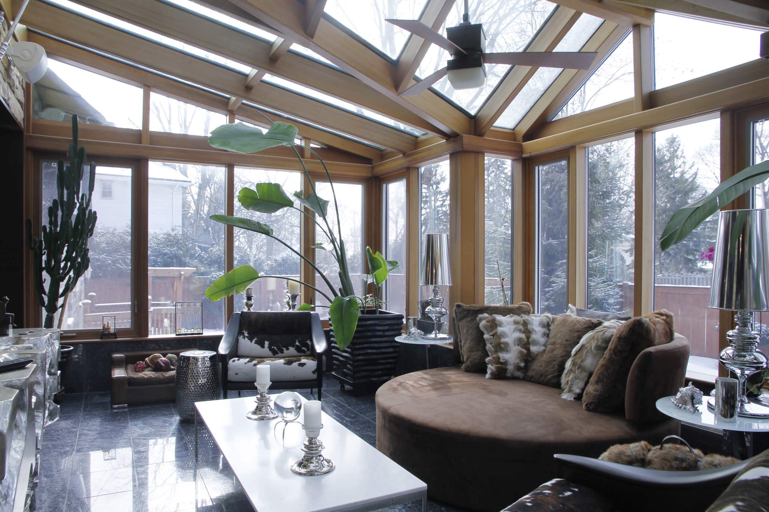 金堂木為江蘇飛翔置業(yè)提供鋁木陽光房案例